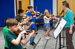 Children playing violins
