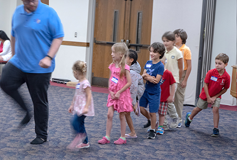 children marching in music game