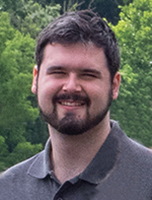 young man in gray shirt